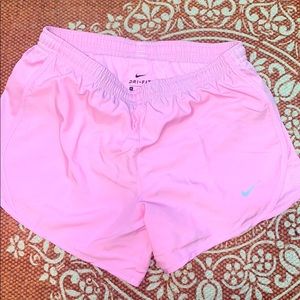 Pink Nike running shorts